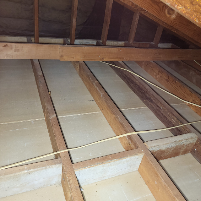 Attic space after old insulation removal