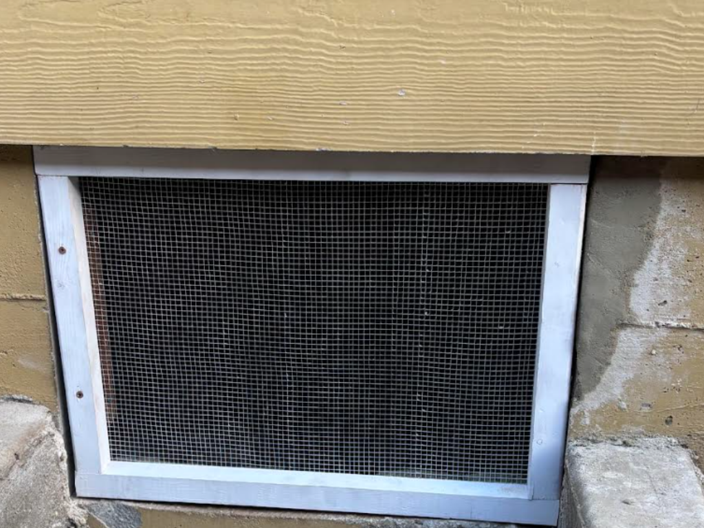 AtticXperts technician preparing rodent proofing service work