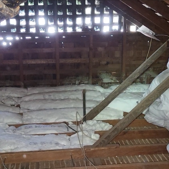 Attic insulation with uneven coverage