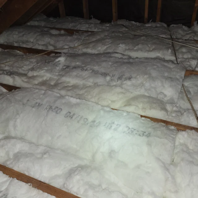 After: Attic Clean Up (Insulation Removal) and Re-Installation