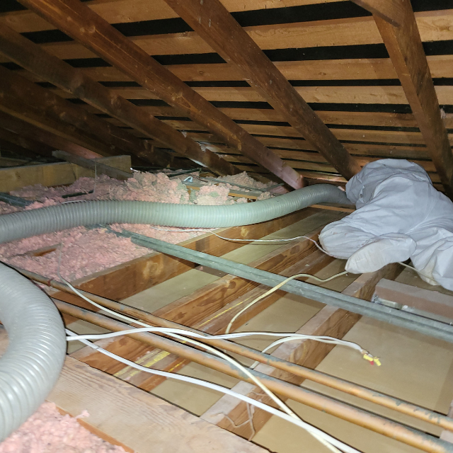 AtticXperts technician on site