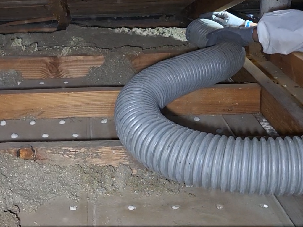 Full attic cleanout in progress